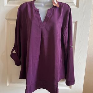 NWT plum color top size large.